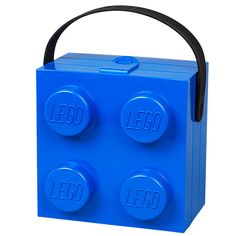 a blue lego brick lunch box with two small round holes on the front and one large square hole at the top