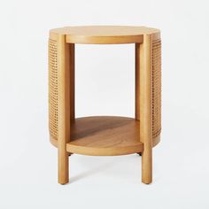 a small wooden table with a shelf on the bottom and one section missing from it