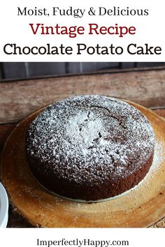 a chocolate cake with powdered sugar on top and the words, most fudy & delicious vintage recipe chocolate potato cake