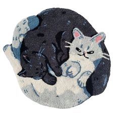 two cats and a dog are laying on the rugs that look like they're hugging