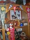 a wooden shelf filled with assorted items