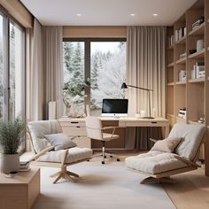 a home office with two chairs and a desk in front of a large window that looks out onto the woods