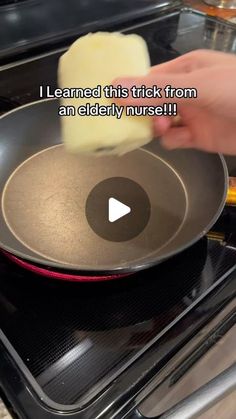 someone is frying something in a pan on the stove