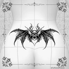 a black and white image of a bat on a tile wall with ornate designs around it