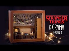 an image of a dollhouse with lights in the background and text that reads strange things