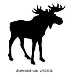 the silhouette of a moose with large antlers