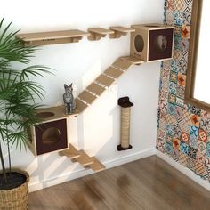 a cat tree in the corner of a room next to a mirror and potted plant