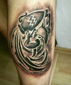 a tattoo on the leg of a man with an eagle and shield in black ink