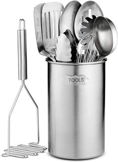 stainless steel kitchen utensils in a metal can with tongs and spatula