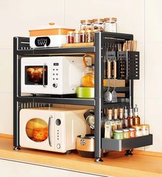 a microwave oven sitting on top of a shelf filled with spices and condiments