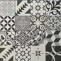 black and white tiles with different designs on them, all in the same color scheme