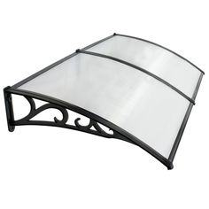 an iron and glass canopy on a white background