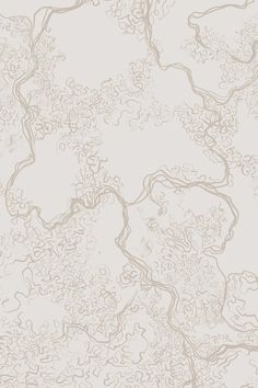 a beige and white wallpaper with swirly lines