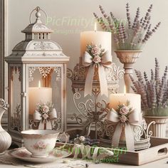 a table topped with candles and vases filled with flowers