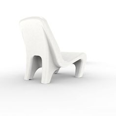 a white chair sitting on top of a white floor