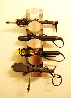 a wall mounted wine rack holding several bottles