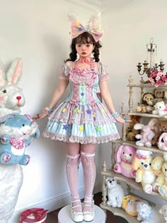 This enchanting piece features a delightful blend of pastel hues, adorned with playful stars and pompoms that evoke the charm of a vintage circus. The back is designed with shirring and a lace-up, ensuring a comfortable and customizable fit. Perfect for those who adore the fusion of Lolita and Clowncore aesthetics.   	 		 			Size 			S 			M 			L 			XL 		 		 			Full Length 			80 			82.5 			85 			87.5 		 		 			Waist 			66-72 			70-76 			74-80 			78-84 		 		 			Bust 			87-93 			91-97 			95-101 			99 Clowncore Dress, Pastel Clowncore, Magic Stars, Circus Dress, Steampunk Fashion Male, Gothic Skirts, Vintage Circus, Star Decorations, Pink Ruffle