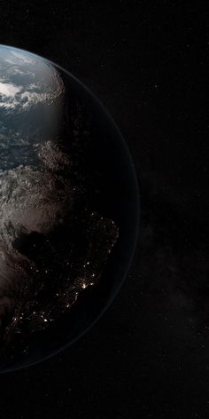 an image of the earth taken from space showing all its lights on and some clouds