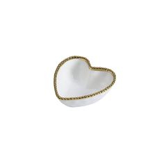 a heart shaped bowl with gold chains on it