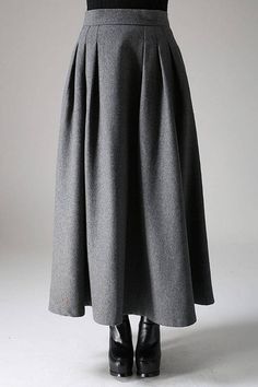 Fluidity and elegance from this chic gray winter skirt. Team it with a chunky sweater, winter boots and an over sized handbag and youre good to go, no matter what the weather throws at you! Youll really be able to turn on the charm with this versatile long pleated skirt. The gray color means Embroidery Challenge, A Line Maxi Skirt, Dark Green Skirt, Long Wool Skirt, Maxi Skirt Winter, Dark Grey Skirt, Pleaded Skirt, Skirt Winter, Ankara Skirt And Blouse