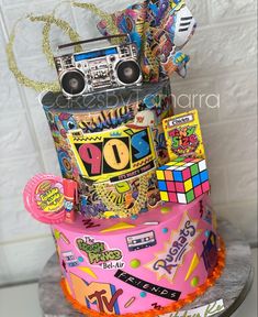 a birthday cake decorated with an assortment of items