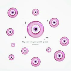 an image of many pink eyeballs in the middle of a circle with words on it