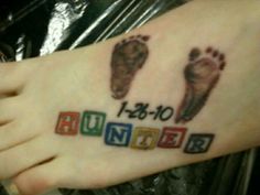 a foot with the word hunter written on it and two feet in different color blocks