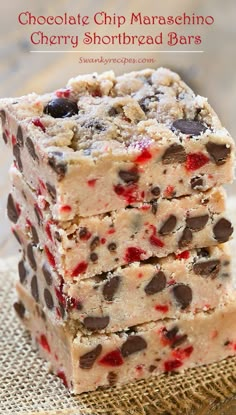 chocolate chip maraschino cherry shortbread bars stacked on top of each other