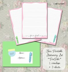 three lined stationery set with pink and green trimmings on the front, two blank