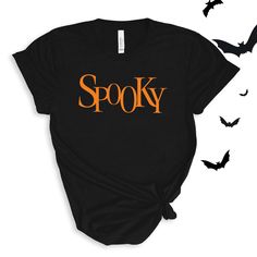 Spooky sweet "Spooky" graphic in your choice of orange or white (graphic colors vary for different color shirts). Perfect for this spooky season! Wear to Halloween parties, or just around town for halloween spirit! For Spooky Adult Sweatshirts click here to view. Adult Sizes S-XXL (unisex sizing)Bella + Canvas4.2 oz. Airlume combed and ring-spun cottonPre-shrunkFor a more relaxed fit, size up! Camp Style, Diy Halloween Projects, Sewing Workshop, Halloween Lights, Halloween Shirts, Football Outfits, Halloween Spirit, Halloween Parties, Halloween T Shirt