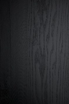 black wood textured background with dark colors