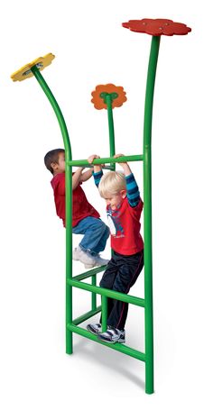 two young boys playing on a green and yellow play tower with flowers in the top