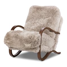 Ethically sourced authentic Mongolian sheepskin covers this unique statement chair, featuring removable feather-foam cushions. A cantilever-like wooden frame pairs with a webbed suspension seat to offer a true sink-in sit Amethyst Home provides interior design, new home construction design consulting, vintage area rugs, and lighting in the Washington metro area. Beige Accent Chair, Statement Chair, Fur Chair, Sheepskin Chair, Mongolian Fur, Statement Chairs, Leather Swivel Chair, Upholstered Arm Chair, Four Hands