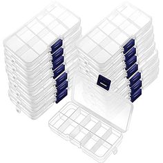 six plastic storage boxes with lids and dividers on each side, one is filled with compartments