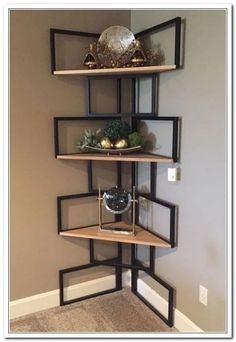 a corner shelf in the corner of a room with some decorations on top of it