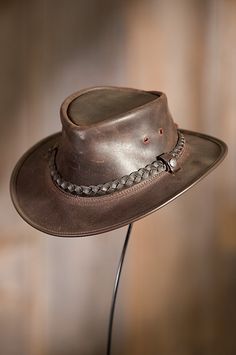 You'll get noticed in this hat that features the distinctive simplicity of crushable leather with a braided leather hatband. Free shipping returns. Diy Leather Hat, Summer Hat Style, Expedition Unknown, Leather Cowboy Hats, Outback Hat, Mens Hats Fashion, Fur Hats, Cowboy Theme, Leather Hat