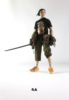 an action figure is posed in front of a white background with the words ao above it