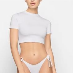 Nwt, Skims Swim Shirt Cropped Tee In Marble White. This Signature Cropped Tee In Swim Top / Coverup Form! Short Sleeve Crewneck Size Down For A Tighter Fit. Sold Out Limited Edition Color! Swim Shirt, Swim Shirts, Marble Colors, Cropped Tee, Swim Top, Crop Tee, Womens Swim, Cover Up, Tights