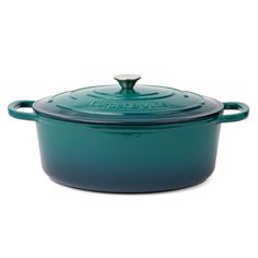 a blue casserole dish with a lid on the top and bottom, in front of a white background