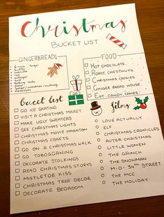 a christmas bucket list on a wooden table