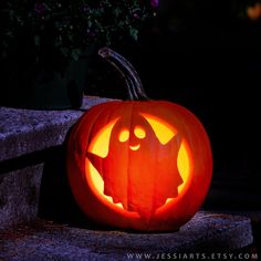 a pumpkin carved to look like a bat