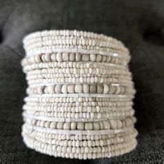 Wide Cream-Colored Boho Bead Cuff Bracelet. Never Worn, Perfect Condition. No Tags... I Bought This At A Jewelry Show And Just Never Wore It. Elegant White Beaded Bangle, White Beaded Cuff Bracelet With Round Beads, White Beaded Round Beads Cuff Bracelet, White Beaded Cuff Bracelet, White Adjustable Wrap Bracelet, White Beaded Bohemian Cuff Bracelet, Adjustable Beaded White Cuff Bracelet, White Bangle Cuff Bracelet As Gift, Adjustable White Bohemian Cuff Bracelet