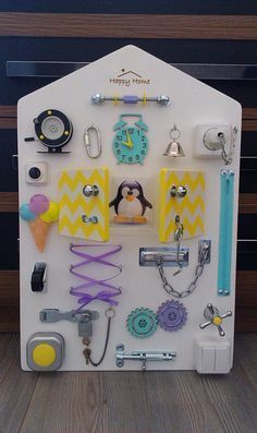 a refrigerator covered in magnets and assorted items