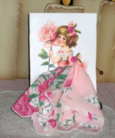 "This beautiful card is 5\" x 8:  an envelope is also included.  \"A Pretty Hanky to use as you please, Just for fun, or to cover a sneeze.\" or Mother's Day Poem The handkerchief is a brand new vintage style hanky 12\" x 12\"." Hanky Crafts, Keepsake Hanky, Handkerchiefs Crafts, Vintage Handkerchiefs Crafts, Hanky Dress, Wedding Hankerchief, Handkerchief Crafts, Mothers Day Poems, Dress Card