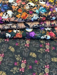 four different fabrics with skulls and flowers on them, all in various colors or patterns