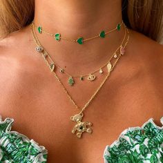 Sometimes your daily pick-me-up is as close as your jewelry box. With a fluttering of kelly green hearts sweetly slung across its choker chain, the Viva Verde gently encourages you to see the brighter side of things. Destined to be the darling of looks that favor bright floral patterns and grounded boho textures. 14k gold plated sterling silver Green enamel hearts 12-15.5 Adjustable in length Can Jewelry, Boho Texture, Green Hearts, Metallic Flats, Choker Chain, Gold Heart Necklace, Choker Style, A Hug, Edgy Look