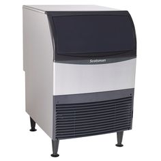 the scotsmart ice machine is sitting on top of a black and silver stand with wheels