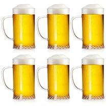 six beer mugs filled with light yellow liquid