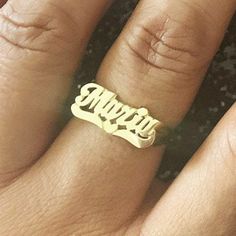 This LEE103 name ring is a classic but timeless jewelry with script letters and lovely heart tail. Personalize this custom ring with the name of your choice. Treat yourself or make it a gift for loved ones, birthdays, anniversaries, or celebrations. * Personalize with name up to 8 characters (only first letter is capitalized) * 10k Yellow or White Solid Gold (weighs about 2.0g to 2.4g) * 14k Yellow, White, or Rose Solid Gold (weighs about 2.1g to 2.6g) * Measures approx. 7.5mm from first initial Custom Name Ring, Name Rings Gold, Mexican Names, Ring With Name, Gold Name Ring, Script Heart, Script Letters, Digital Wardrobe, Jewelry Classic