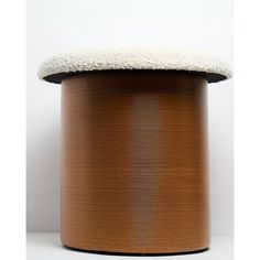 a round wooden stool with a white cushion on it's top, against a white background